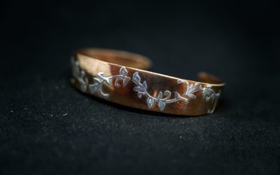 copper bracelet decorated with silver
